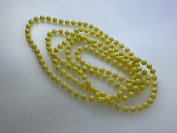 Vintage 58” Necklace With Yellow Plastic Beads Us… - image 1
