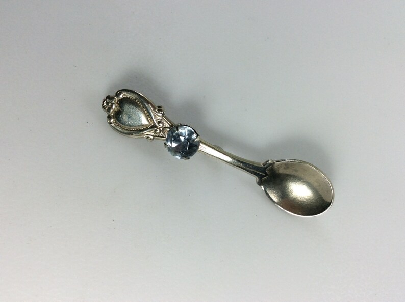 Vintage Pin Brooch Silver Toned Spoon With Heart Flower And Blue Rhinestone Used