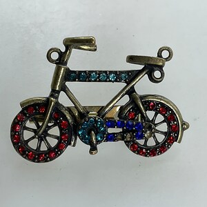 Vintage Pin Brooch Gold Toned Bicycle With Red And Blue Rhinestones Missing Stones Used