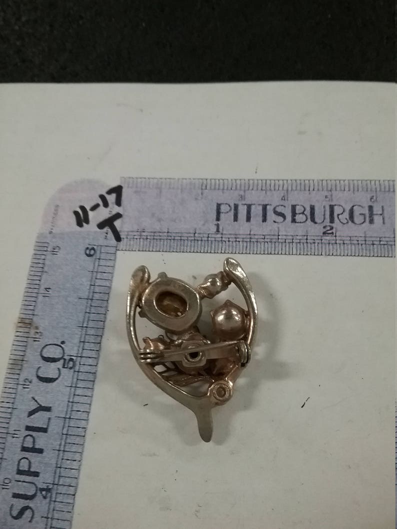 Vintage silvertone wishbone rhinestone pin missing 1 rhinestone