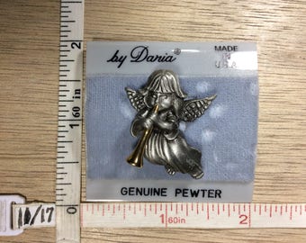 Adorable vintage Christmas angel Pewter angel girl blowing a gold tone trumpet signed Daria designer brooch