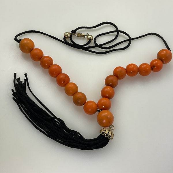Vintage 26” Necklace With Orange Beads And Tassel On Black Cord Used