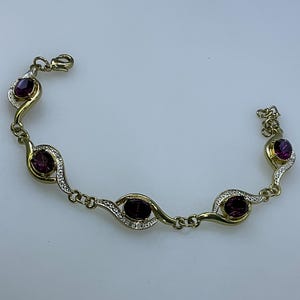 Vintage 7”-8” Bracelet Gold Toned Ovals With Purple And Clear Rhinestones Used