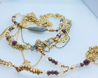 Vintage 20” 4 Strand Necklace With Brown, Clear, Gold Beads Used