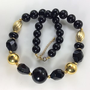 Vintage 17&quot;-19&quot; Necklace With Gold Toned And Black Beads Used