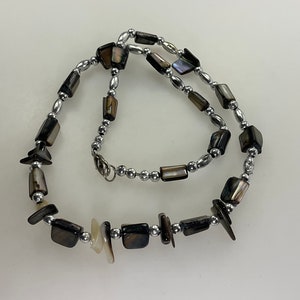 Vintage 17” Necklace With Silver Toned And Brown Shell Beads Used