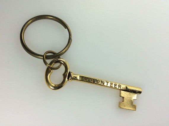Vintage Keychain Gold Toned Skeleton Key With Vol… - image 1