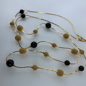 Vintage 36” Necklace With Gold Toned Textured And Black Plastic Beads Used