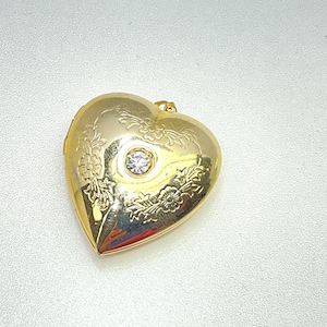 Vintage Gold Toned Heart Shaped Locket With Clear Stone And Floral Accent Used