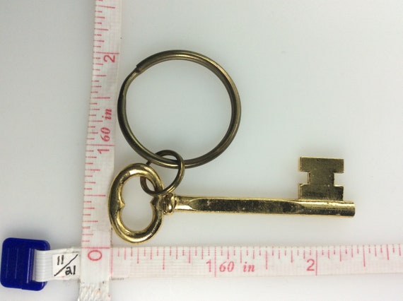 Vintage Keychain Gold Toned Skeleton Key With Vol… - image 2
