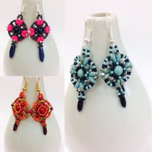 May include: Three pairs of dangle earrings with a geometric design. The earrings are made with black, silver, and turquoise beads. The earrings are on a white background.