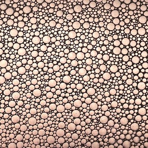 May include: Abstract pattern featuring a dense arrangement of varying-sized, off-white circles against a dark background. The circles create a textured, almost bubbly appearance, with a subtle gradient effect.