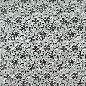 May include: A set of three ceramic mugs with a speckled, matte finish. The mugs are in shades of cream, light gray, and dark gray. Each mug has a simple, minimalist design and a rounded handle. The mugs are likely for coffee or tea.