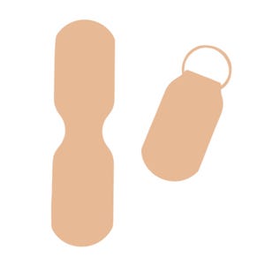 May include: Two beige-colored keychains, one shaped like a simple oval and the other shaped like a small bottle with a ring at the top.