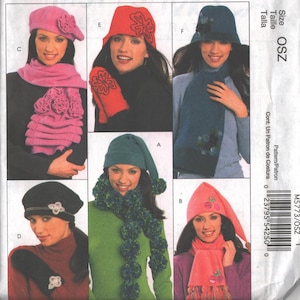 May include: McCall's Fashion Accessories pattern featuring various hats, scarves, and gloves. The image showcases a pink beret with a flower, a red cloche hat with matching gloves, and a teal cloche hat. Other items include a green elf hat and a pink pointed hat.