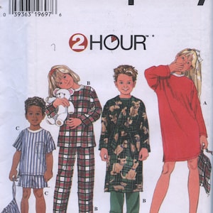 May include: Simplicity sewing pattern number 7407 for children's pajamas. The pattern includes three different styles: a red nightgown, a plaid pajama set, and a robe with a dog print. The pattern is labeled "2 Hour" and includes sizes AA 3, 4, 5, and 6.