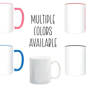 May include: Five white ceramic mugs with different colored rims and handles. The mugs are arranged in a row with the text "MULTIPLE COLORS AVAILABLE" in the center.