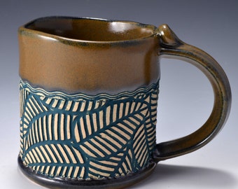 Stoneware Mug with Impressed Pattern of geometric leaves, Ancient Copper Red Glaze - 12 ounces by Tom Bottman