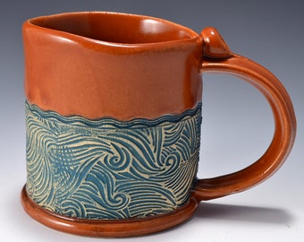 Stoneware Mug with Impressed Pattern of Swirling Waves, Satin Paprika Red Glaze - 12 ounces by Tom Bottman