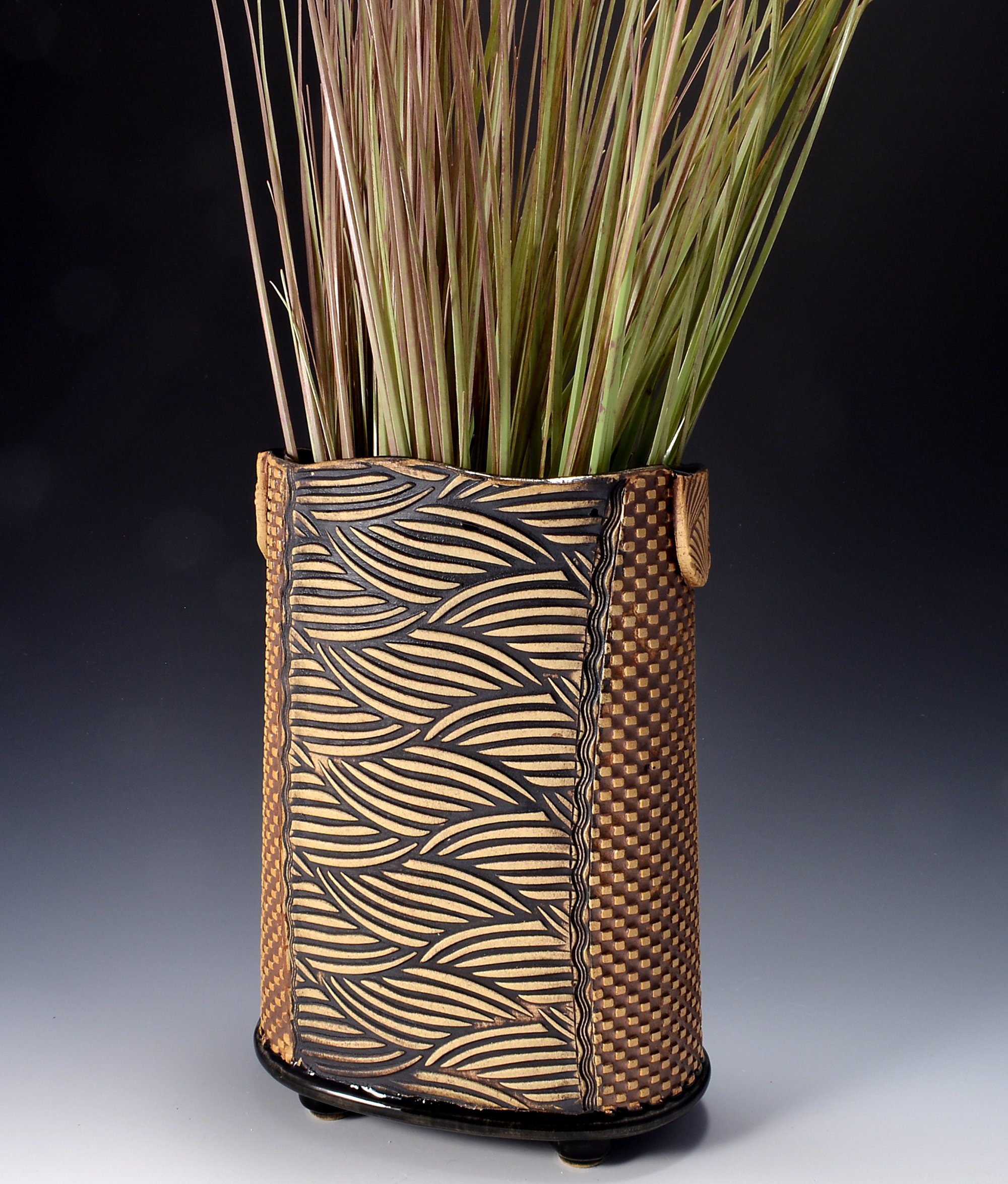 Tall Oval Vase Stoneware with Gloss Black Glaze and Unglazed Exterior