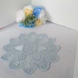 Doily, Embroidered in Pastel Blue Hint with a10.50" Diameter