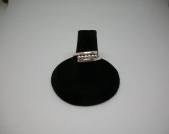 Handmade Sterling Silver Ring.  Full round beaded wire with square wire outline.  Contemporary , simple tailored look.