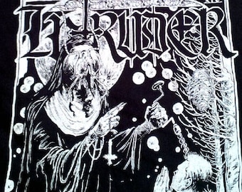 May include: Black t-shirt with a white graphic print of a hooded figure holding a cross and a chain. The graphic also includes the text "TRIUMPHER" and "XIV".