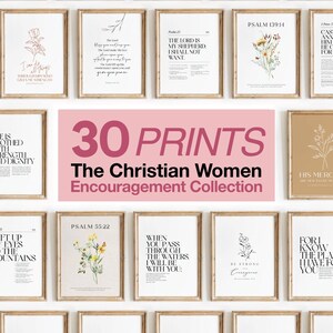 May include: A display of 30 framed prints featuring motivational quotes and floral illustrations. The prints include text such as "Psalm 55:22" and "The Christian Women Encouragement Collection". Each print is in a wooden frame.