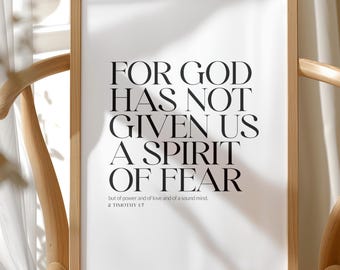 May include: A framed print with the text "FOR GOD HAS NOT GIVEN US A SPIRIT OF FEAR" in black font. The print is in a light brown wooden frame and is displayed on a wooden chair. The words "DIGITAL DOWNLOAD" are at the top.
