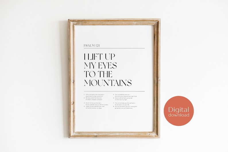 May include: A printable wall art print with a white background and black text. The text reads "PSALM 121 I LIFT UP MY EYES TO THE MOUNTAINS". The print also includes the full text of Psalm 121.