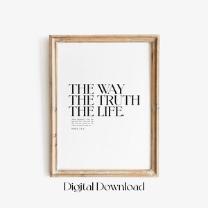 May include: A framed print with a white background and black text that reads "THE WAY THE TRUTH THE LIFE."  The text is centered on the page and is followed by a smaller text that reads "Jesus answered, "I am the way and the truth and the life. No one comes to the Father except through me." JOHN 14:6"