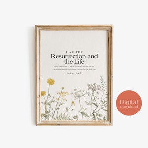 May include: A printable digital download of a framed print with a floral design and the text "I am the Resurrection and the Life" with a Bible verse from John 11:25.