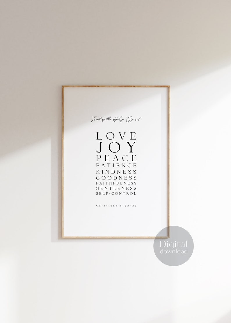May include: A printable wall art design featuring the fruits of the Holy Spirit in black text on a white background. The text reads "Fruit of the Holy Spirit" followed by "Love, Joy, Peace, Patience, Kindness, Goodness, Faithfulness, Gentleness, Self-Control." The text also includes "Galatians 5:22-23".