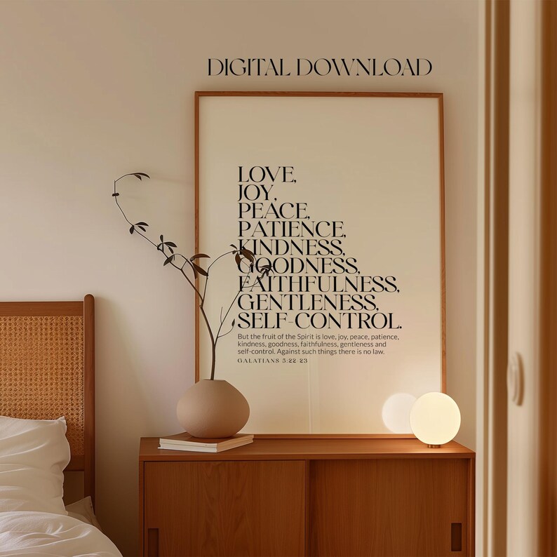 May include: A digital download printable wall art print with a beige background and black text. The text reads "LOVE JOY PEACE PATIENCE KINDNESS GOODNESS FAITHFULNESS GENTLENESS SELF-CONTROL." The text is followed by a Bible verse from Galatians 5:22-23.