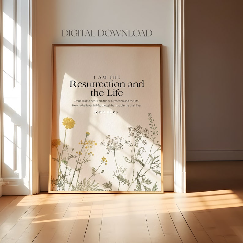 May include: A printable art print with a white background and a floral design. The print features a quote from the Bible, "I am the Resurrection and the Life." The quote is from John 11:25.