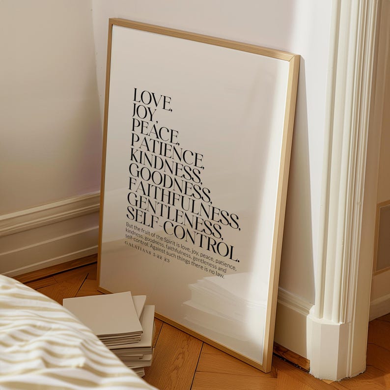 May include: A framed print with a white background and black text. The text is a list of words: Love, Joy, Peace, Patience, Kindness, Goodness, Faithfulness, Gentleness, Self-Control. The text is from Galatians 5:22-23.