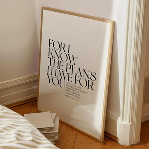 May include: A framed print with a white background and black text that reads "For I know the plans I have for you" and a quote from Jeremiah 29:11.