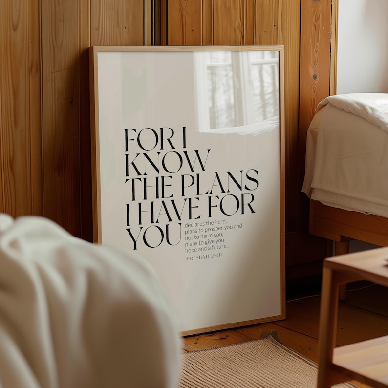May include: A beige poster with black text that reads "FOR I KNOW THE PLANS I HAVE FOR YOU declares the Lord, plans to prosper you and not to harm you, plans to give you hope and a future JEREMIAH 29:11"