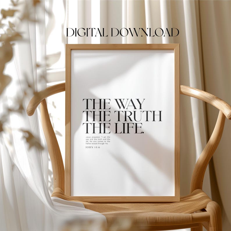 May include: A framed print with a white background and black text that reads "THE WAY THE TRUTH THE LIFE."  The text is in a bold, sans-serif font.  Below the text is a smaller font that reads "Jesus answered, 'I am the way and the truth and the life. No one comes to the Father except through me.'"  The text is followed by "JOHN 14:6".