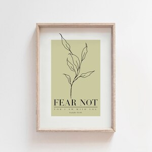 May include: A printable wall art design with a green background and a black line drawing of a branch with leaves. The text "FEAR NOT FOR I AM WITH YOU Isaiah 41:10" is printed in black.