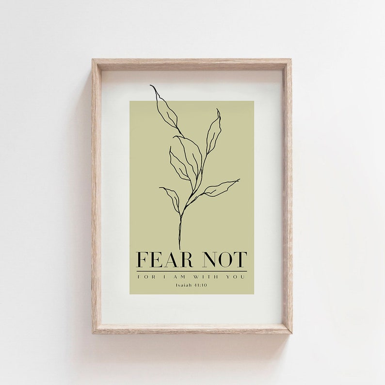 May include: A printable wall art design with a green background and a black line drawing of a branch with leaves. The text "FEAR NOT FOR I AM WITH YOU Isaiah 41:10" is printed in black.