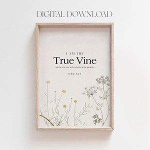 May include: A printable art print with a white background and a wooden frame. The print features a botanical illustration of green and yellow wildflowers with the text "I am the True Vine. I am the true vine, and my Father is the gardener. John 15:1"