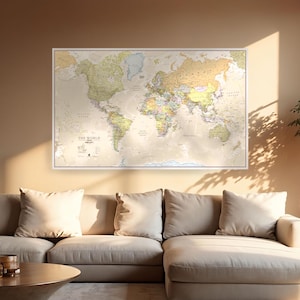 May include: A rectangular wall map titled THE WORLD featuring a muted color palette with beige, light green, and soft yellow tones. The map displays continents, countries, and oceans with clear text labels, enclosed in a thin white frame.
