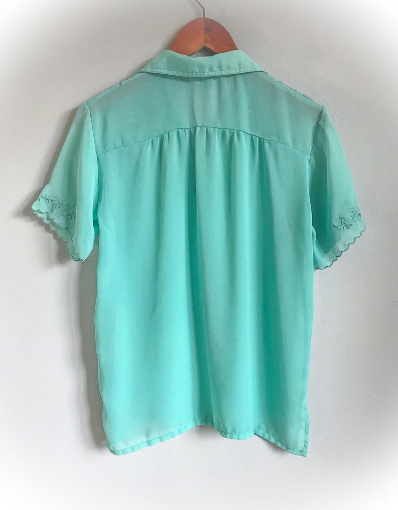 aqua green blouse