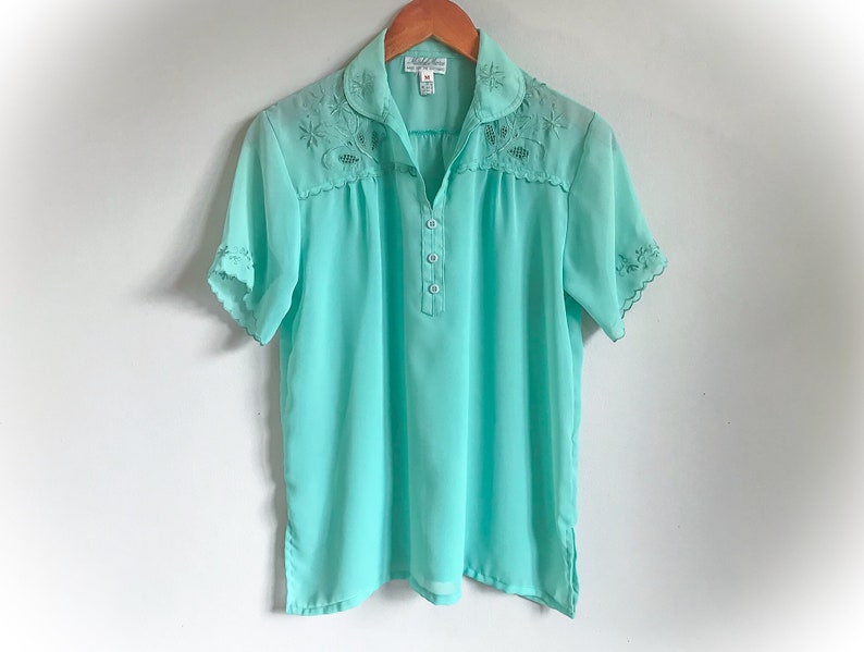aqua green blouse