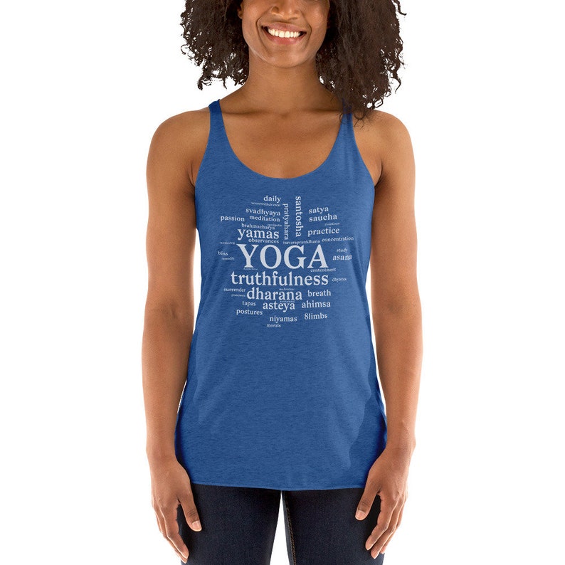 May include: A blue tank top with a white word cloud design that includes the word "YOGA" and other related terms like "truthfulness", "dharana", and "asteya".