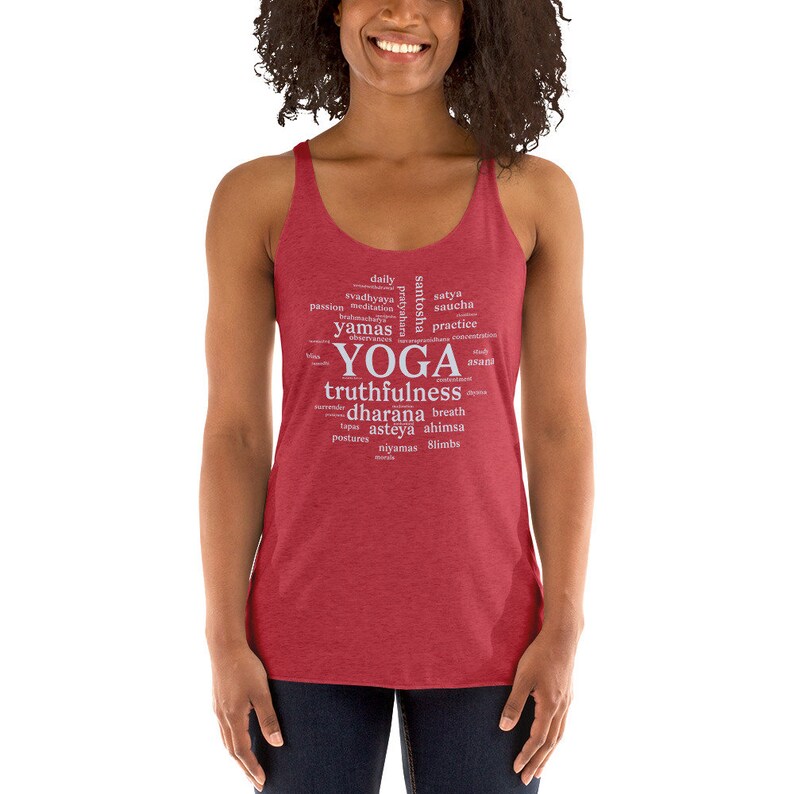 May include: Red tank top with a white word cloud design that includes the word "YOGA" and other related terms like "truthfulness", "dharana", and "ahimsa".