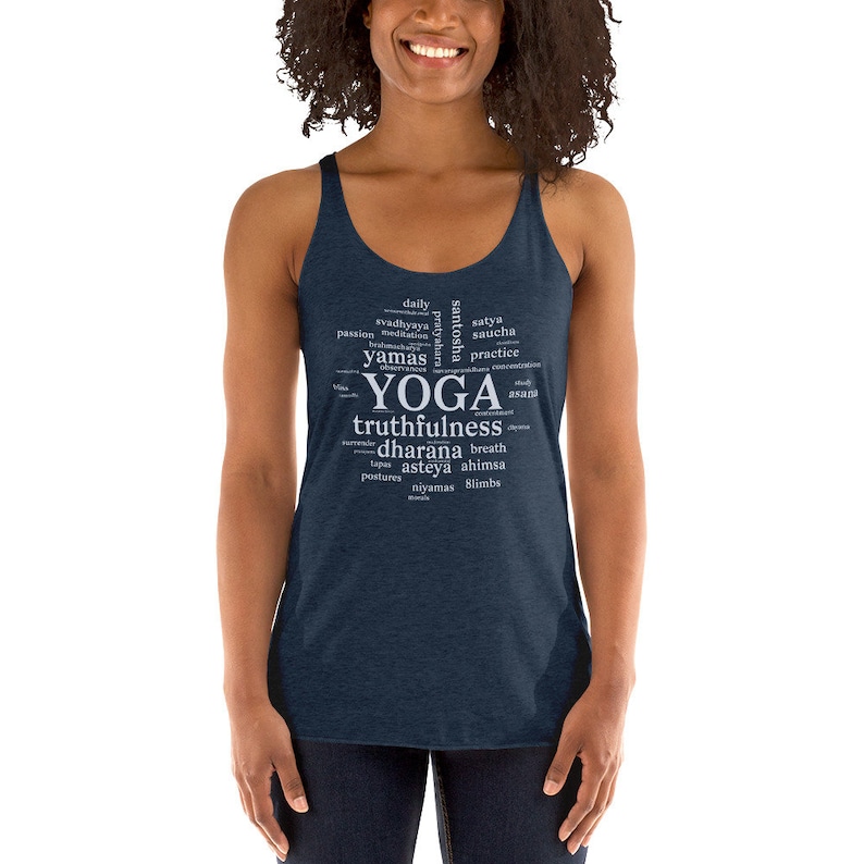 May include: A navy blue tank top with a white word cloud design that includes the word "YOGA" and related terms like "truthfulness", "dharana", and "ahimsa".