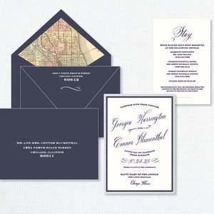 May include: A wedding invitation suite with a navy blue envelope and a white card with silver accents. The invitation reads "Together with their families, Georgia Harrington and Connor Blumenthal invite you to celebrate their marriage 10.24.25 Three o'clock in the afternoon Saint Mary of the Angels Chicago, Illinois"