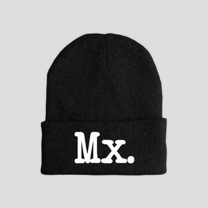 May include: Black beanie with a white "MX." embroidered on the front.